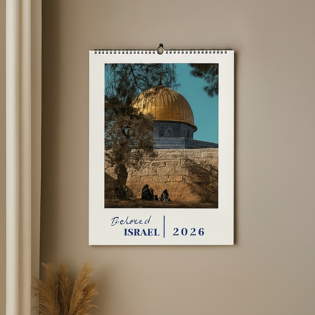 Calendar with a scenic view of a golden dome on a wall.